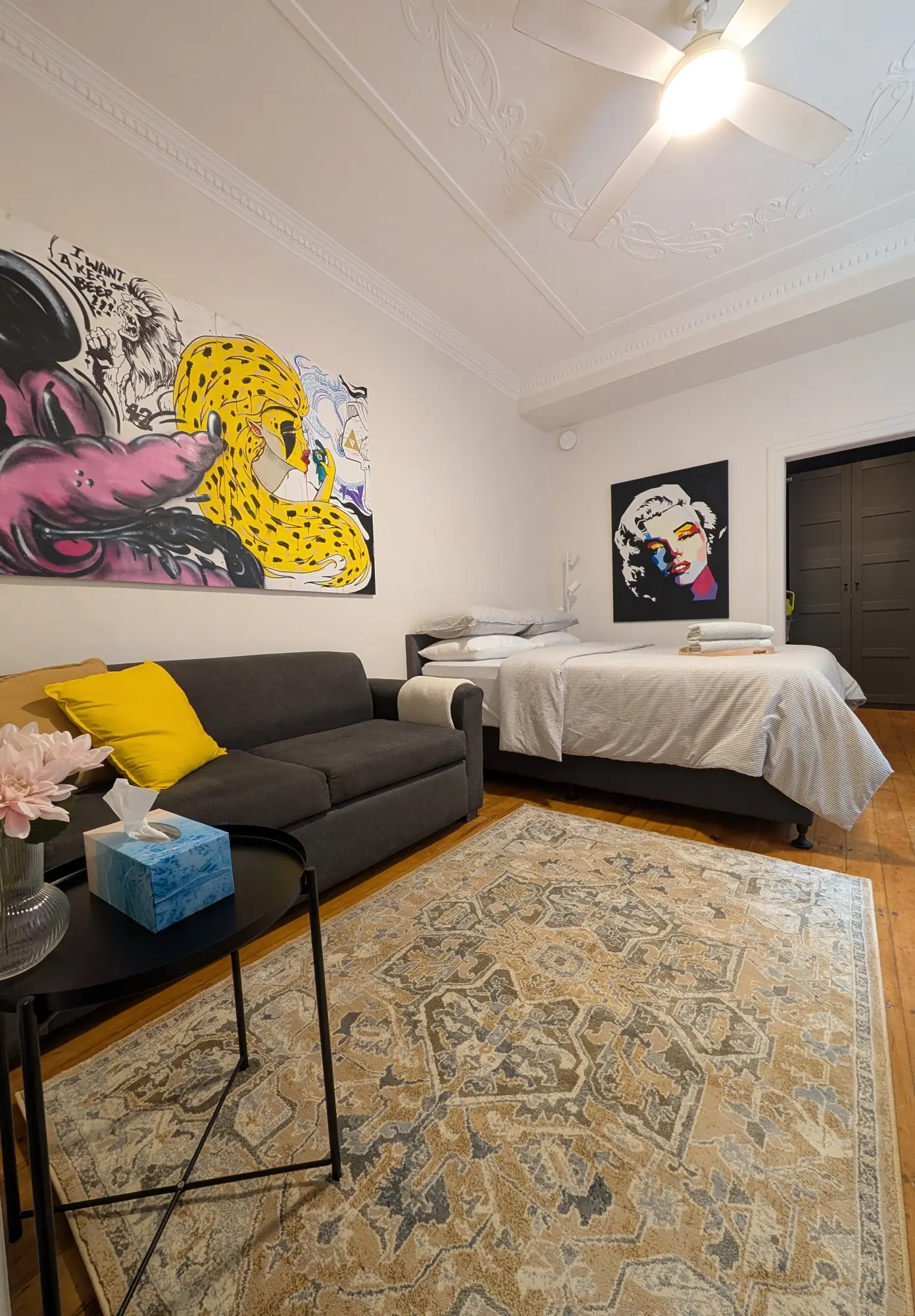 Living space and queen bed at Laneway Studio, Surry Hills